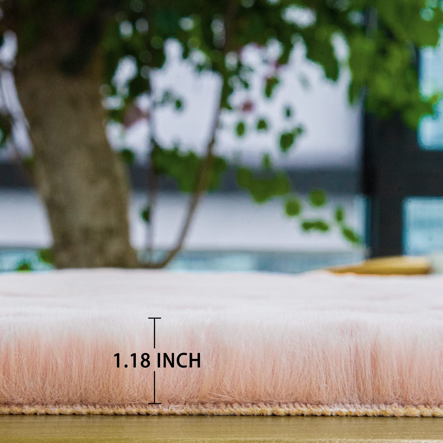 ORINOVA pink faux fur rug enhances cozy decor in any living space.