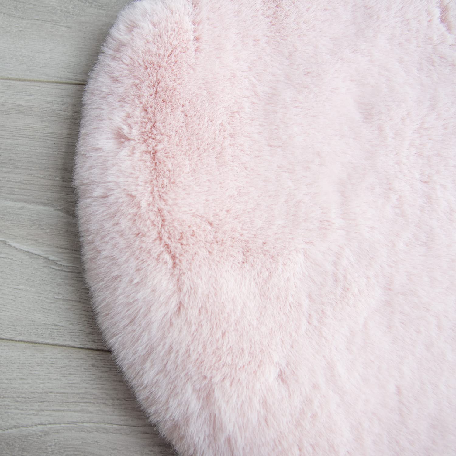 ORINOVA child-friendly rug offers soft surface for playtime and reading.