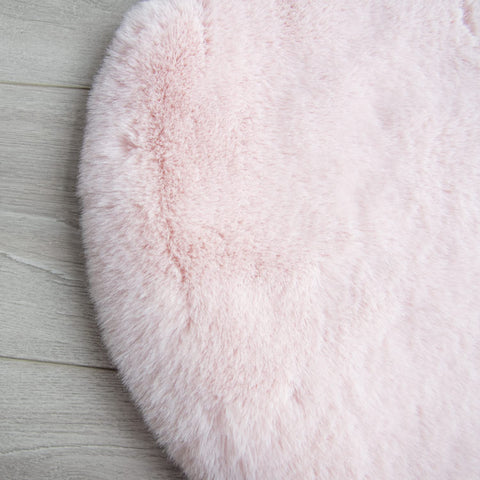 ORINOVA child-friendly rug offers soft surface for playtime and reading.