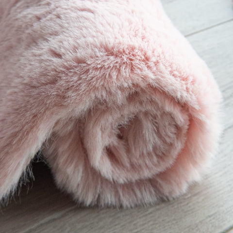 ORINOVA textured rug with durable stitching for long-lasting use.