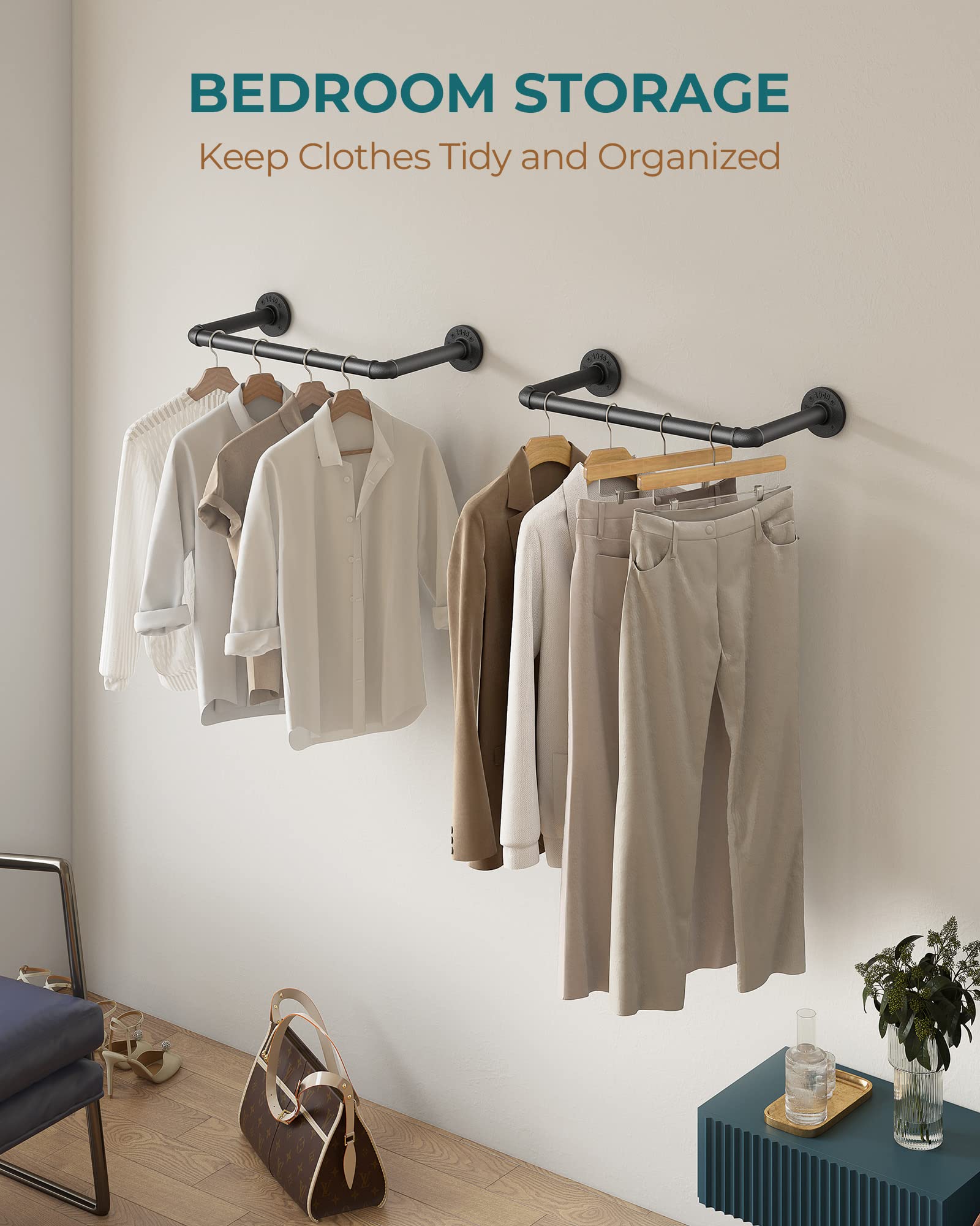 OROPY Industrial Pipe Clothes Rack wall-mounted close-up showing durable black iron pipes.