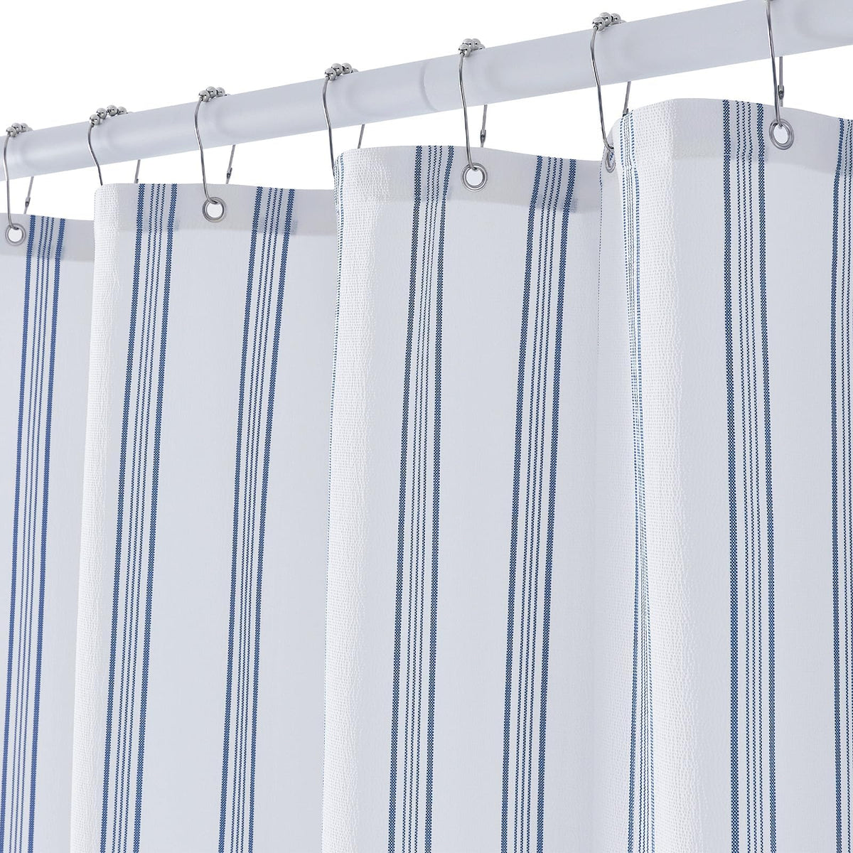 ORTIGIA blue and white striped shower curtain with 12 hooks, ready for effortless installation
