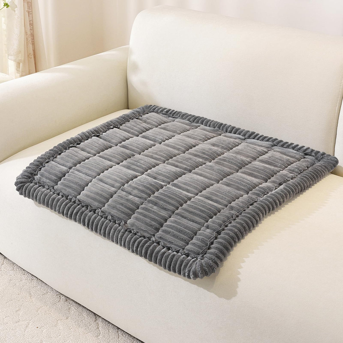 OstepDecor washable dog couch cover protects furniture from scratches and spills.