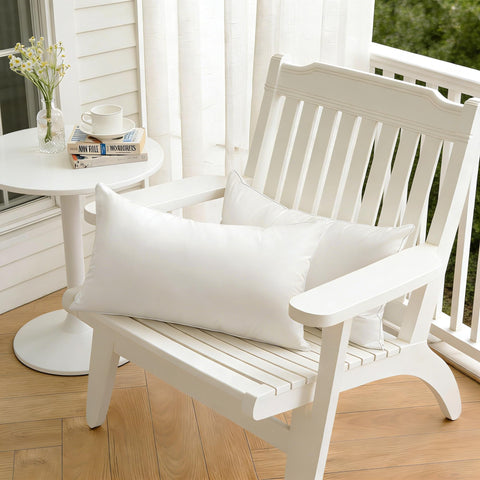 Oubonun outdoor pillow insert on sofa and bed setup.