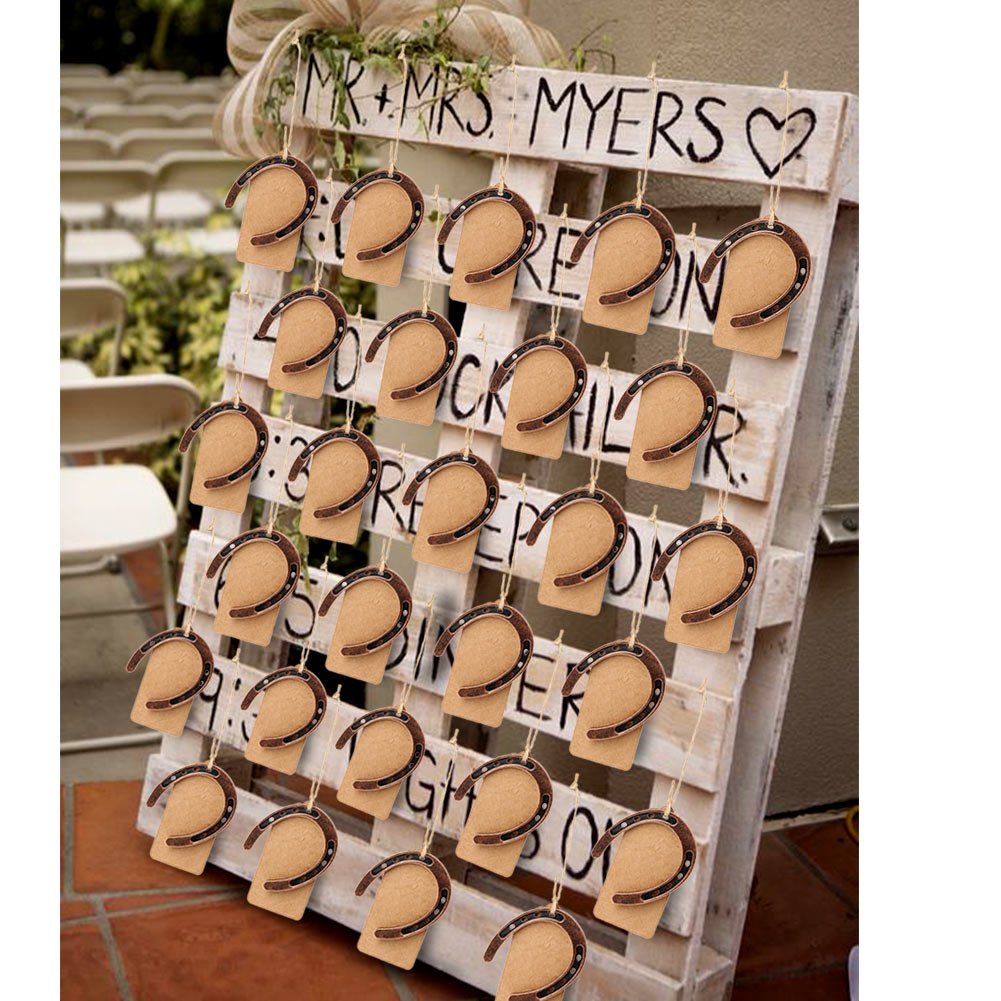 OurWarm tree-hanging decor idea creates interactive guest moments.