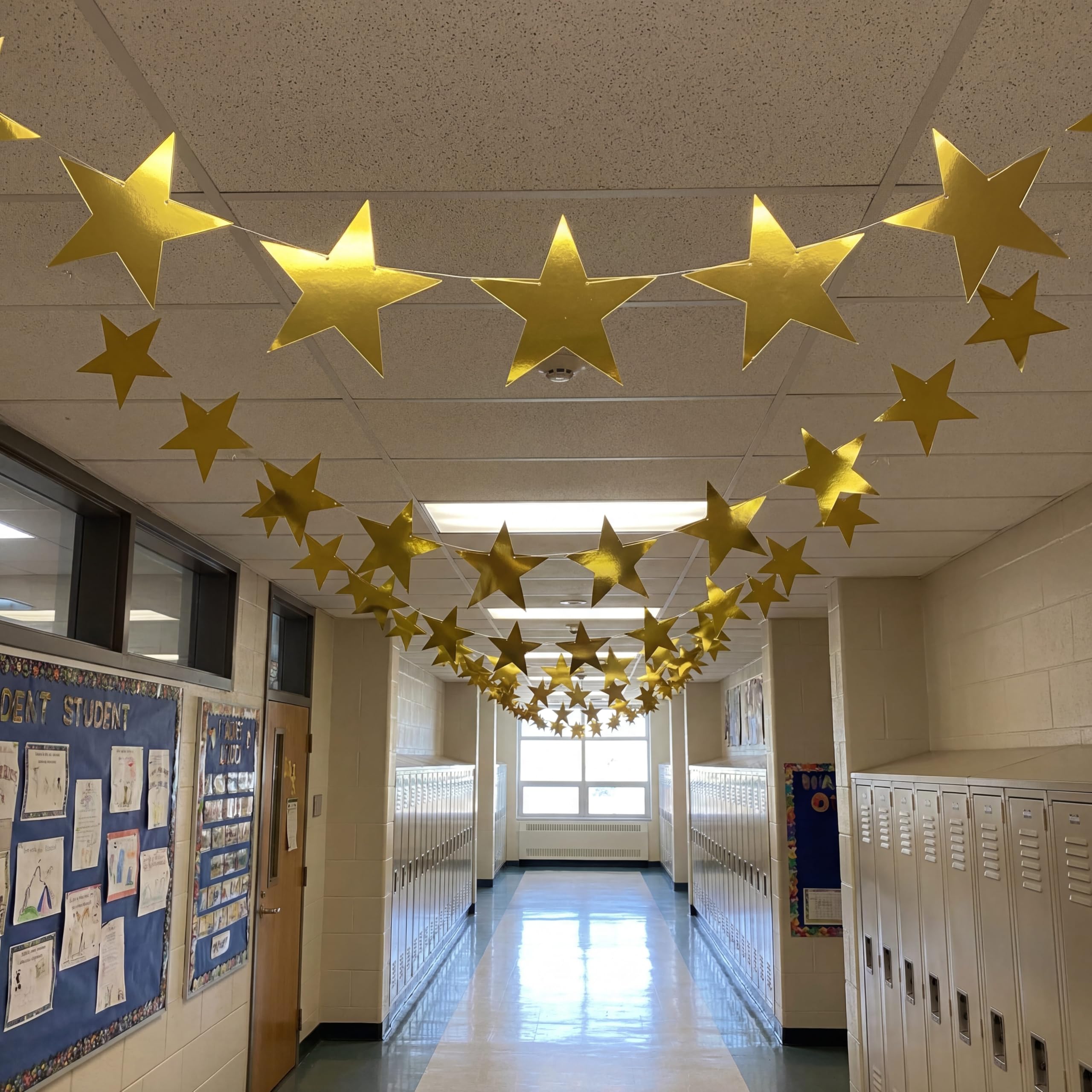 Outus gold star wall decor enhances classroom or party spaces.