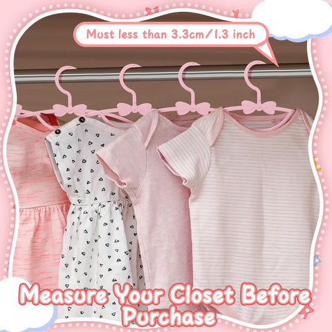 Ovveroche pink baby hanger featuring built-in grooves for accessories