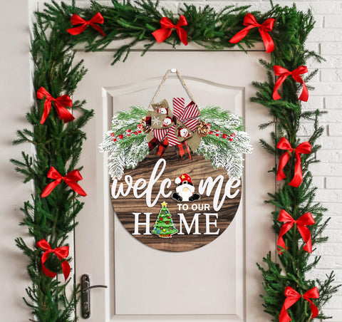 OWUH snowman pendant provides a playful holiday accent on the sign.