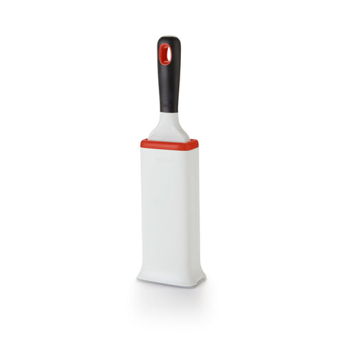 OXO Furlifter close-up showing micro bristles lifting fur from fabric