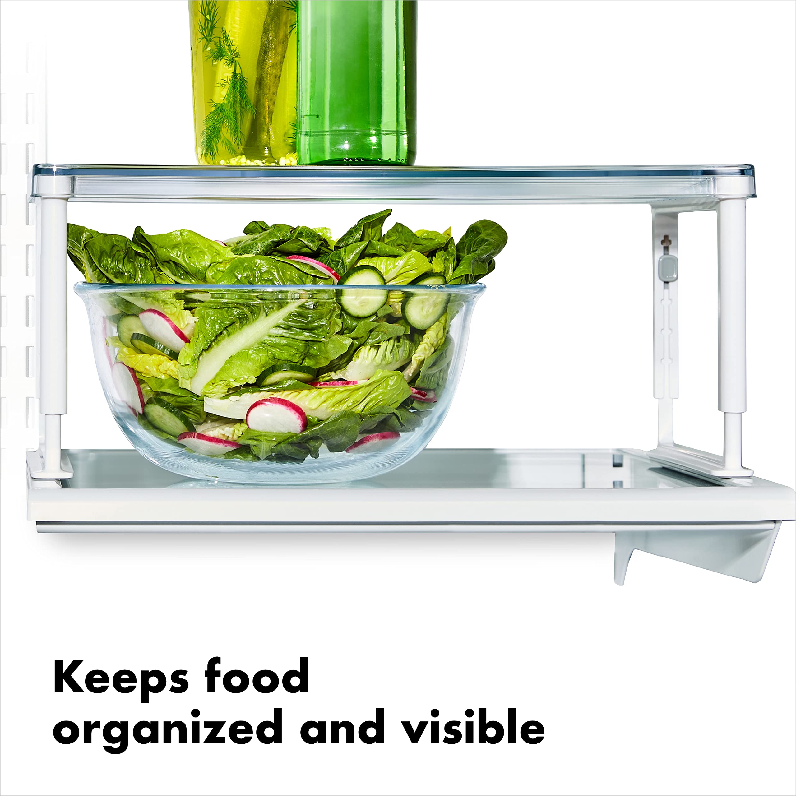 Elevates jars and yogurts with the OXO Good Grips Riser for easy label viewing