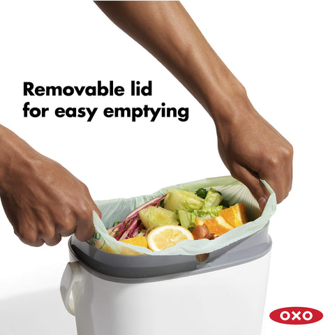 OXO Good Grips compost bin handle, easy transport between prep areas.