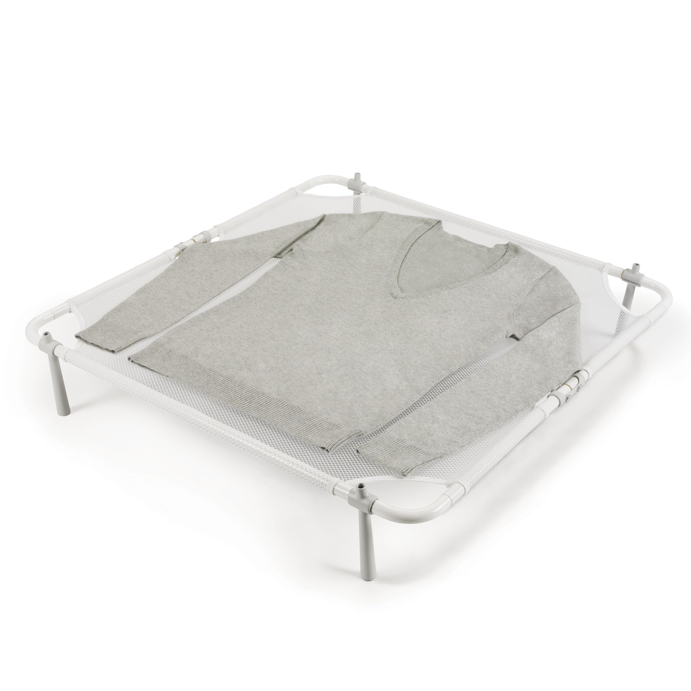 OXO Good Grips Folding Sweater Dryer on a clean table for delicate air drying