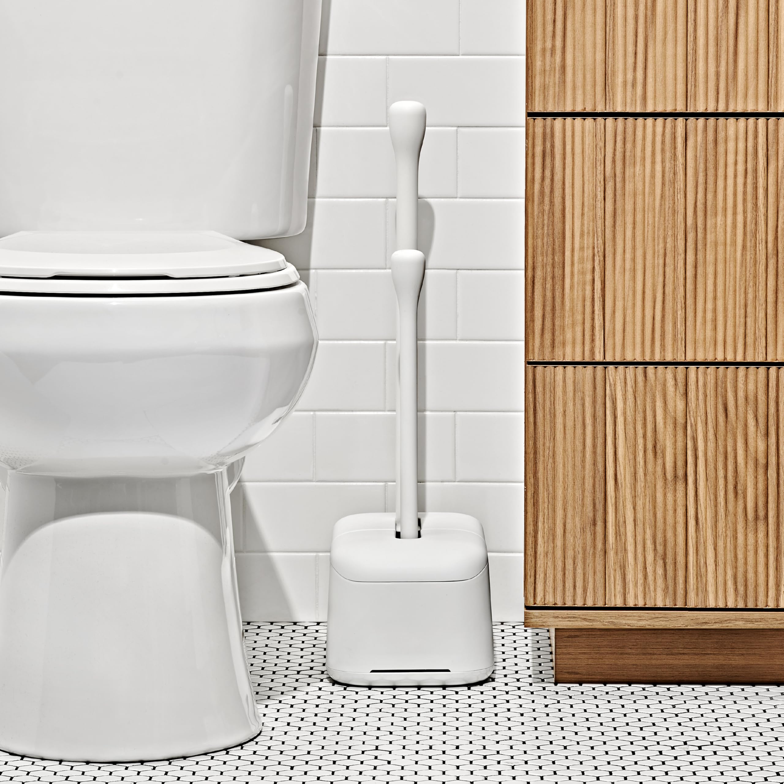 OXO Good Grips plunger in canister offers quick, accessible use.