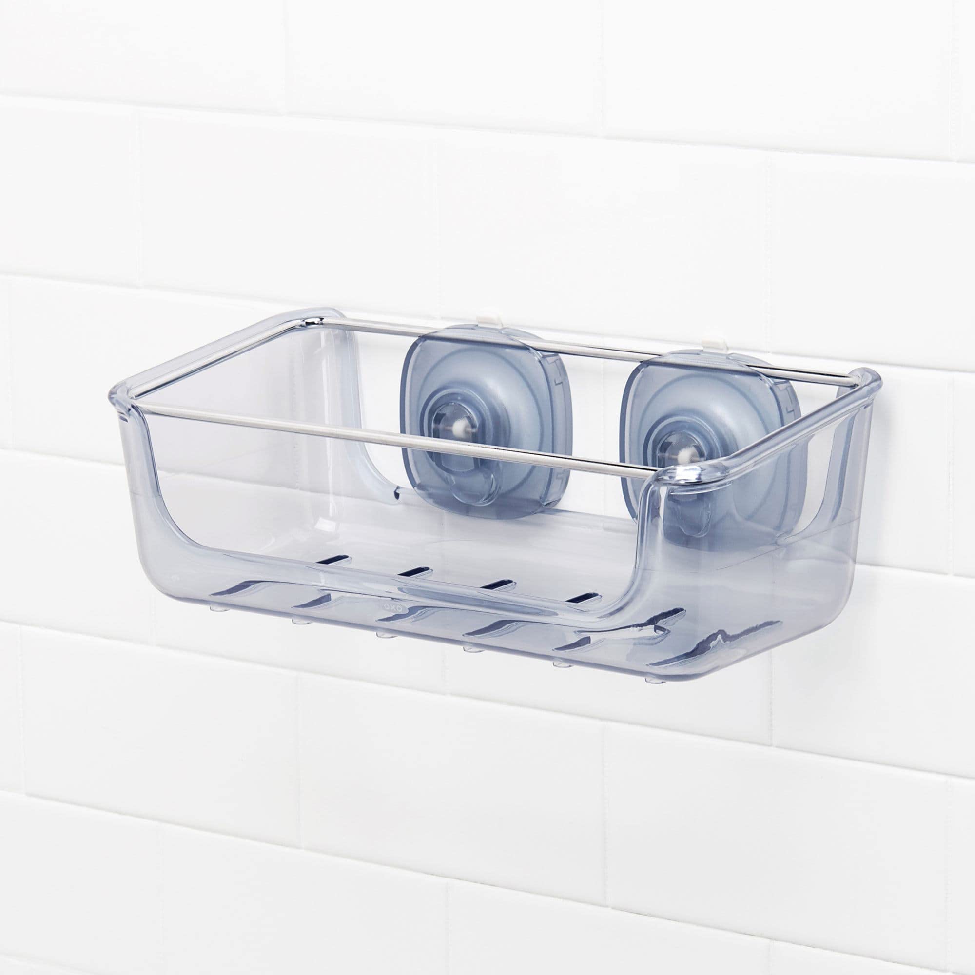 Suction cups slide to avoid grout lines for cleaner installation.