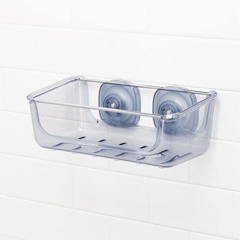 Suction cups slide to avoid grout lines for cleaner installation.