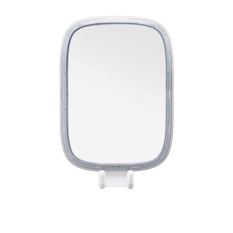 OXO Good Grips suction cup attachment provides secure, tool-free mounting on glass or tile.