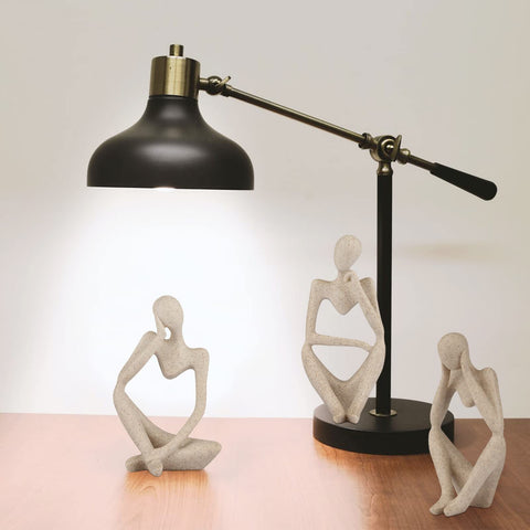 Ozzptuu Sandstone Resin Thinker front view complements office decor.