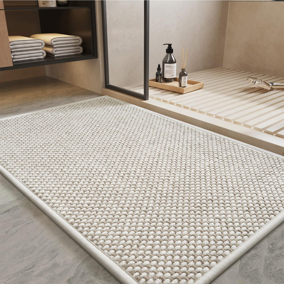 PADOOR chenille-absorbency bath mat keeps feet dry after shower.