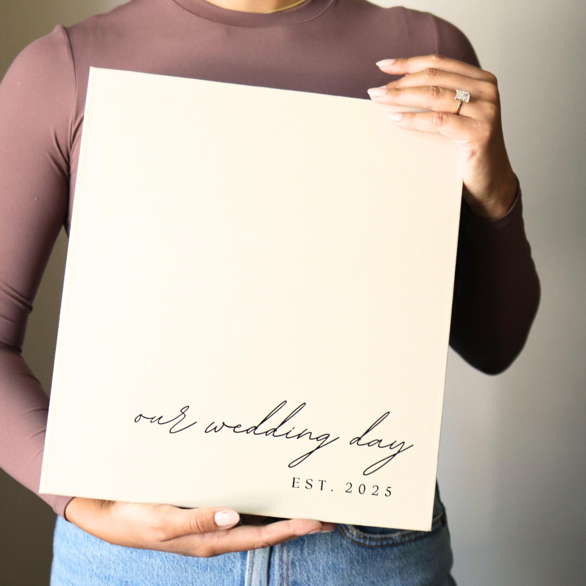 Paige McRae wedding album with 400 pockets for organized memories.