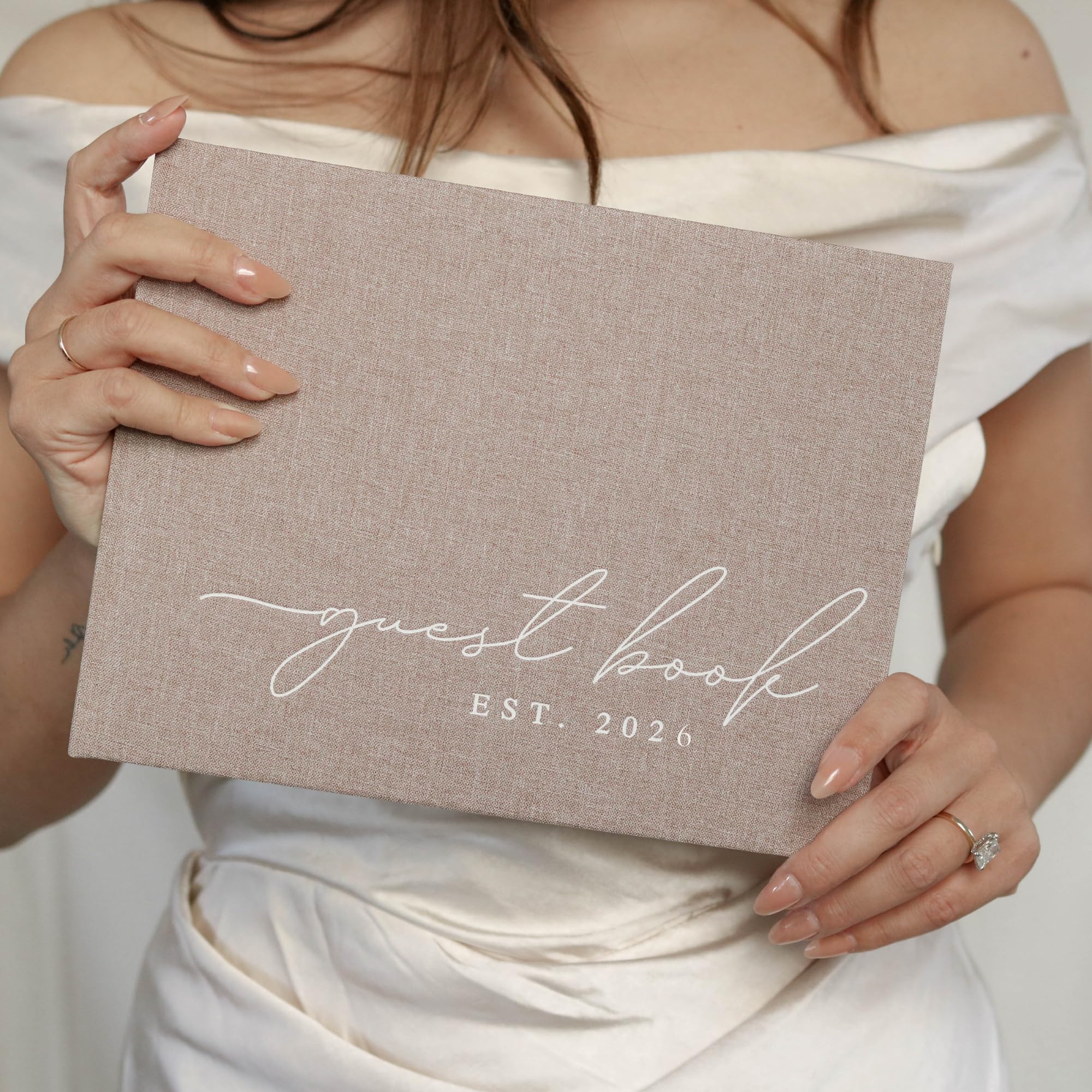 Paige McRae year customization on the guest book adds a personal touch to your celebration