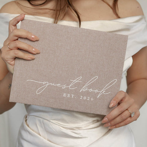 Paige McRae year customization on the guest book adds a personal touch to your celebration