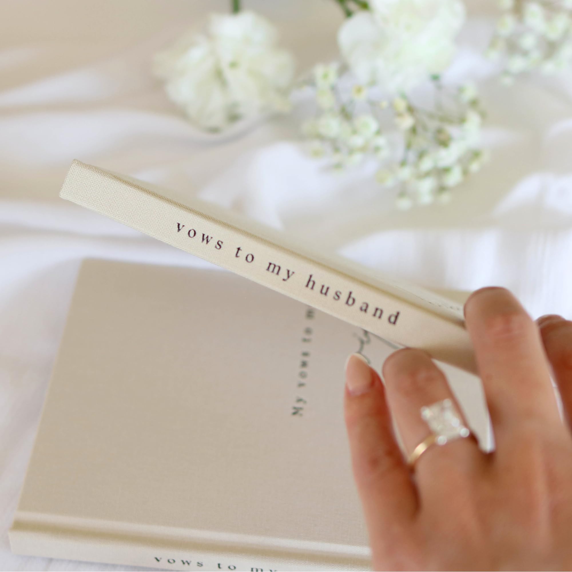 Paige McRae vow books stitched binding durable, flat lay friendly ceremony prop