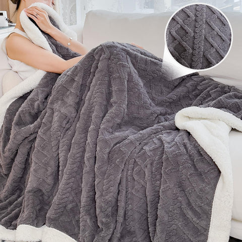 PAJEO Sherpa blanket with reversible comfort for year-round use.