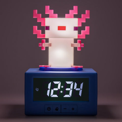 Paladone Minecraft Axolotl alarm clock night light glows softly at bedtime.