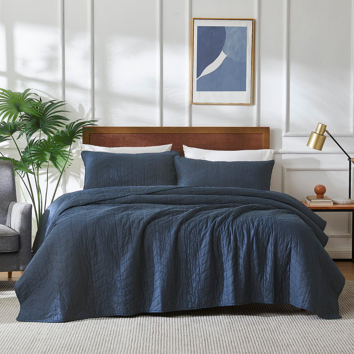 Palassio navy blue quilt twin coverlet shows smooth fabric for all-season warmth.