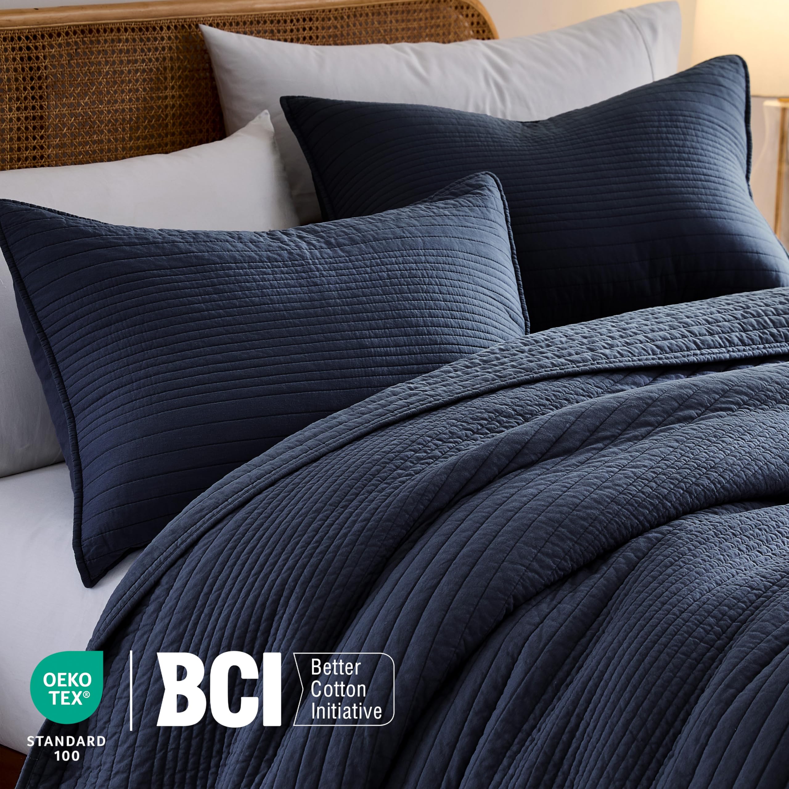 Palassio quilt on bed with matchng shams in a chic look