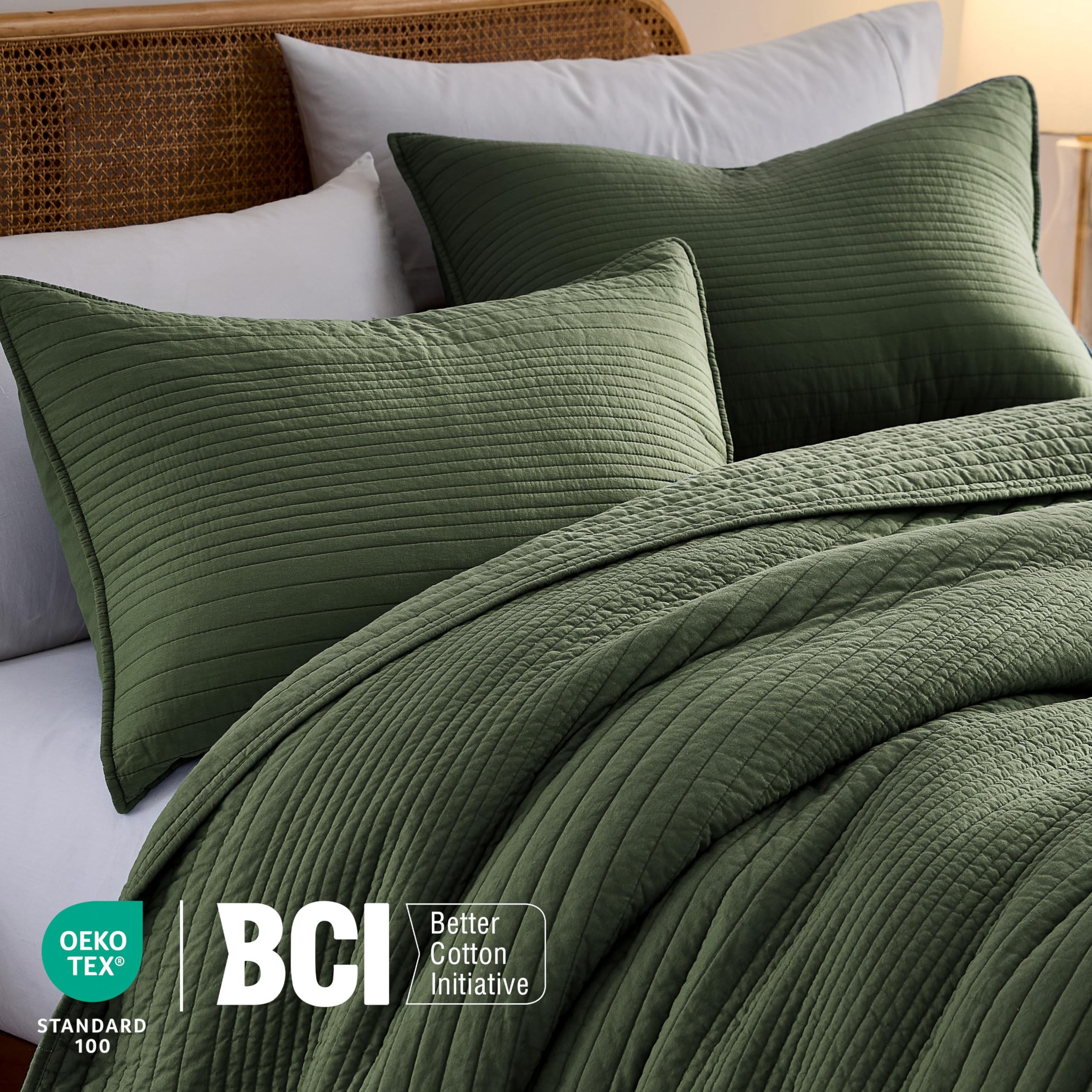 Palassio striped olive green quilt king-size set on bed demonstrates lightweight versatility