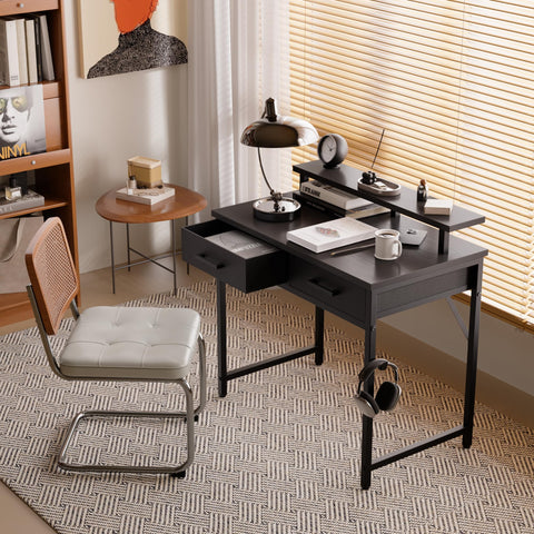 Pamray desk with two drawers keeps stationery and documents organized.