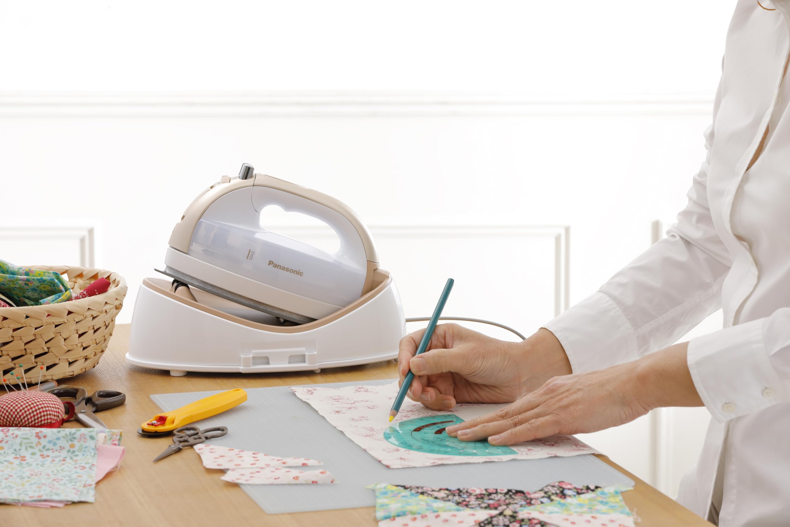 Cordless Panasonic 360 Freestyle iron in use for quick touch-ups.
