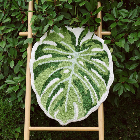 Monstera-pattern palm leaf kitchen mat adds tropical charm and comfort underfoot.