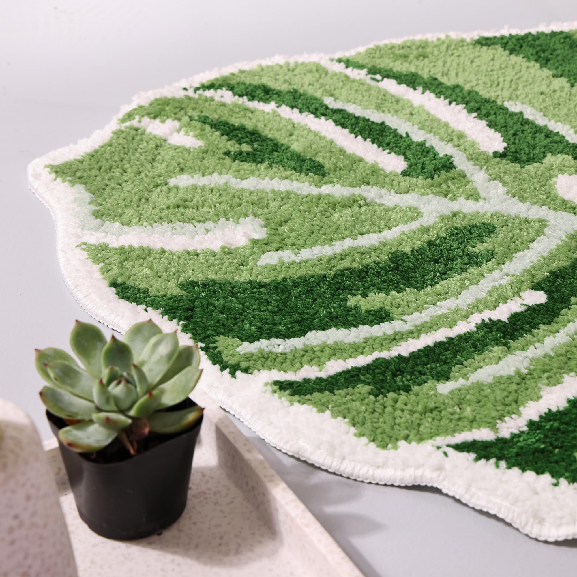 Panstar palm leaf door mat suits entryways with tropical flair.
