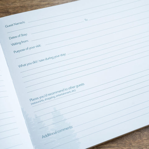Paper 'n Such guest book 10x8 inch size provides ample writing space on a coffee table.
