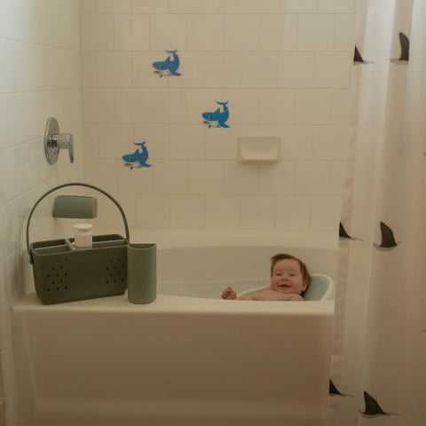 Parker Baby Co. bath toy organizer with a sturdy handle for easy transport.