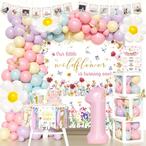 Party Inspo Wildflower backdrop for a soft first birthday photo moment