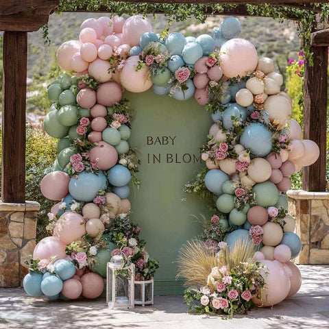 Partycus dusty green balloons add a soft, neutral tone for gender reveal decor.