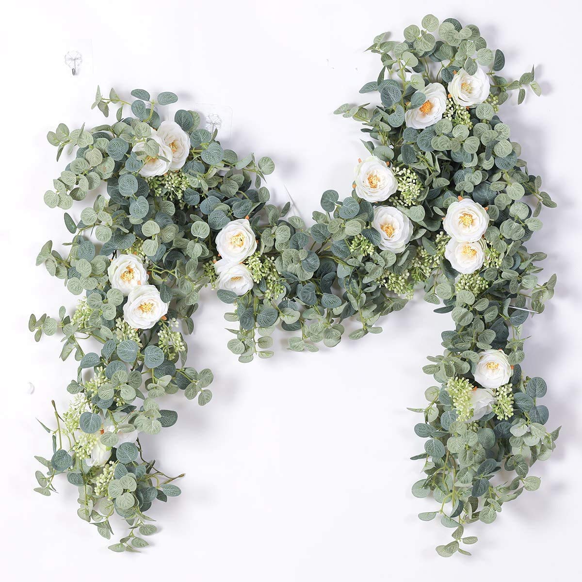Party Joy eucalyptus garland with white roses for wedding backdrop and festive walls.