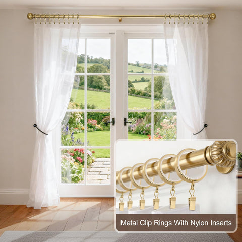 Parutta gold curtain rings with nylon inserts for whisper-quiet movement.