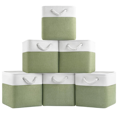 Patvingot 11-inch cube bin in white and green stacked neatly in a closet for organization