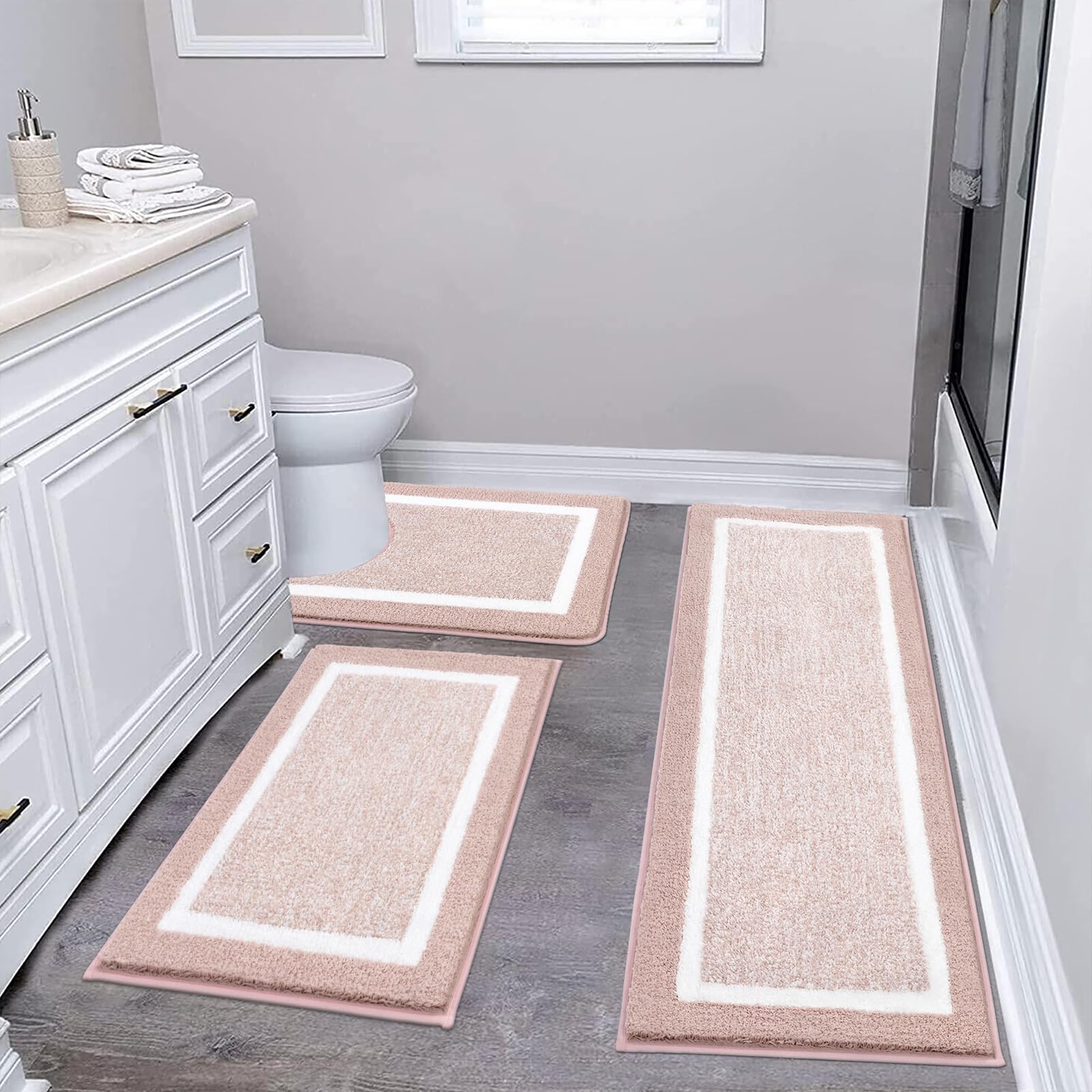 Pauwer 3-piece bath mat set in dusty pink with soft shaggy texture for feet comfort