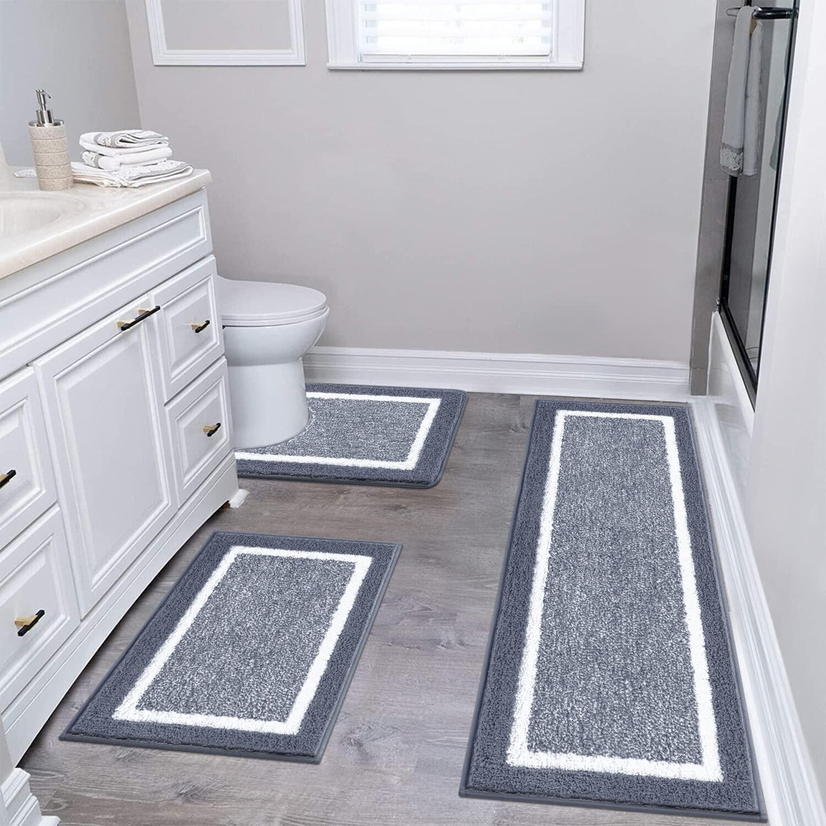 Pauwer bath rug set ultra soft microfiber texture for plush feet.