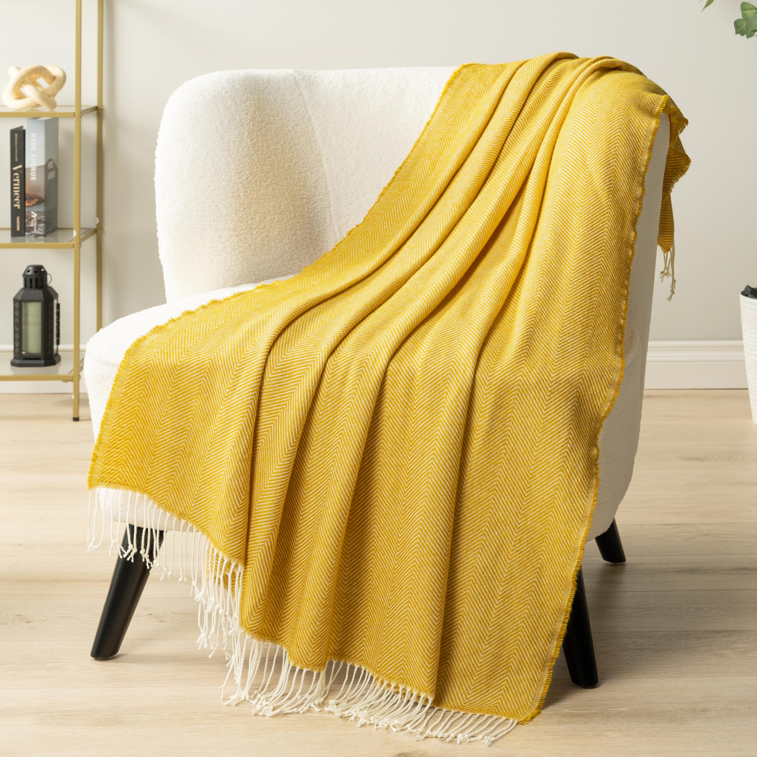 PAVILIA decorative yellow blanket draped over chair elevates room style