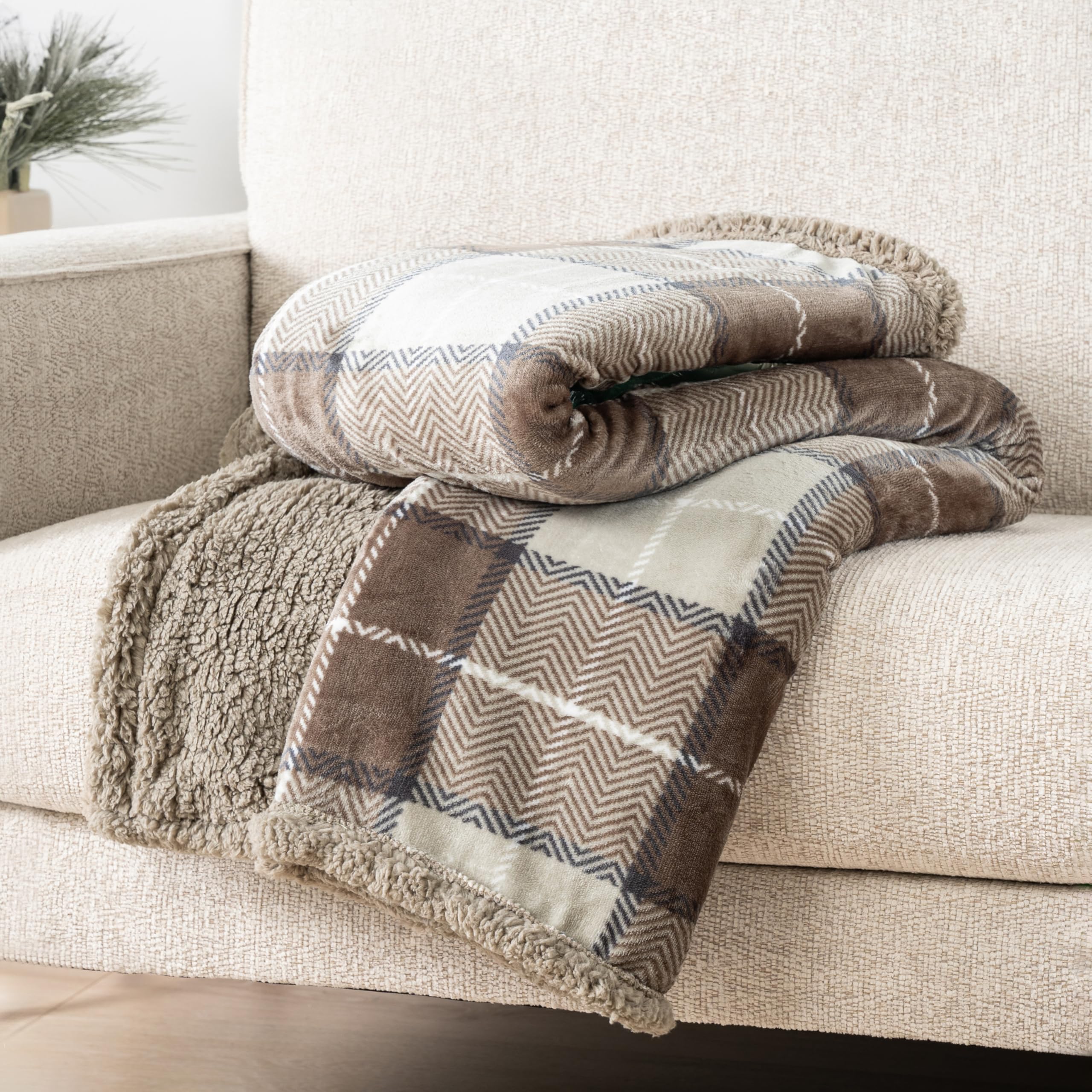 PAVILIA gift-ready sherpa blanket enhances cozy living room decor.
