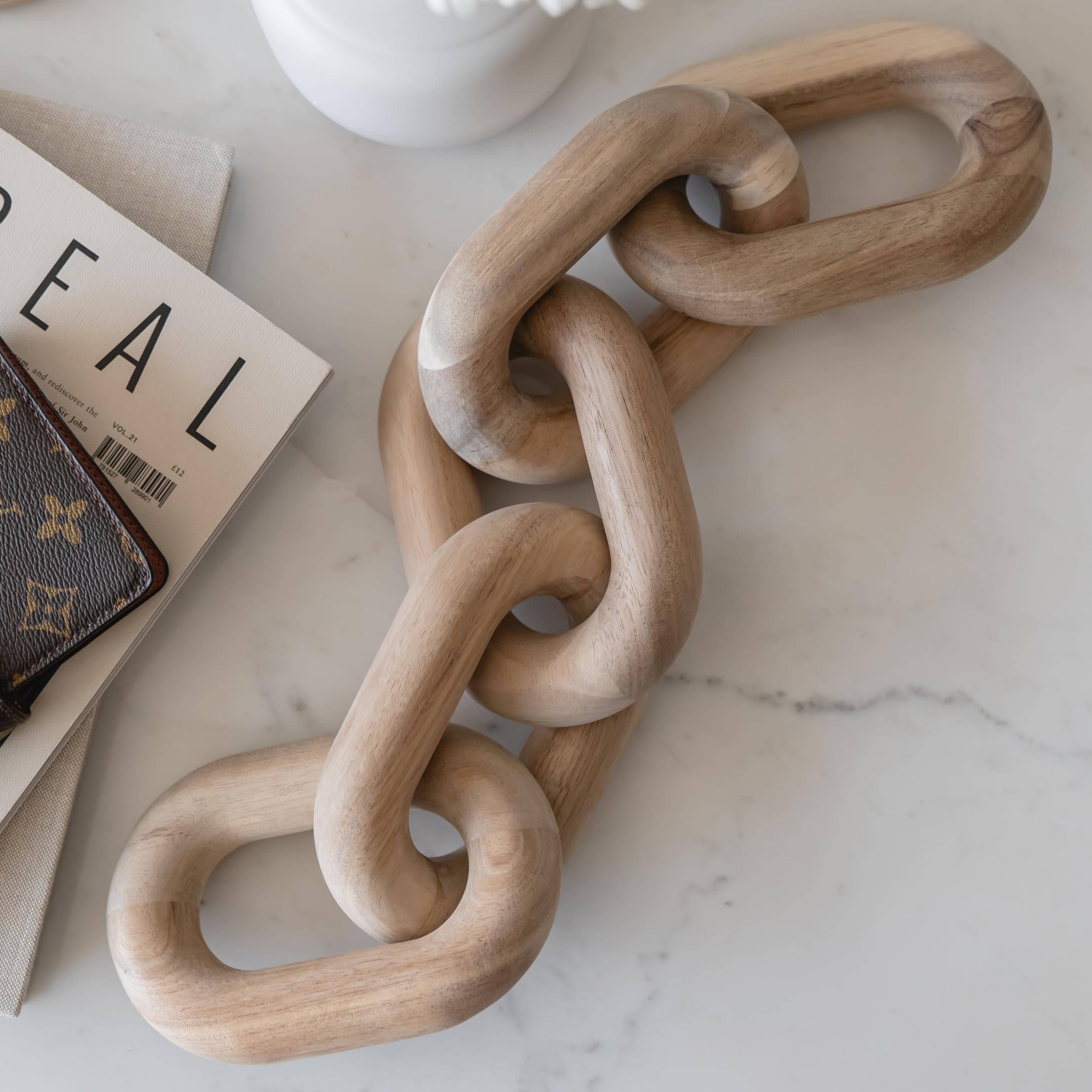 Peakoly acacia chain link decor on coffee table adds modern warmth to living room