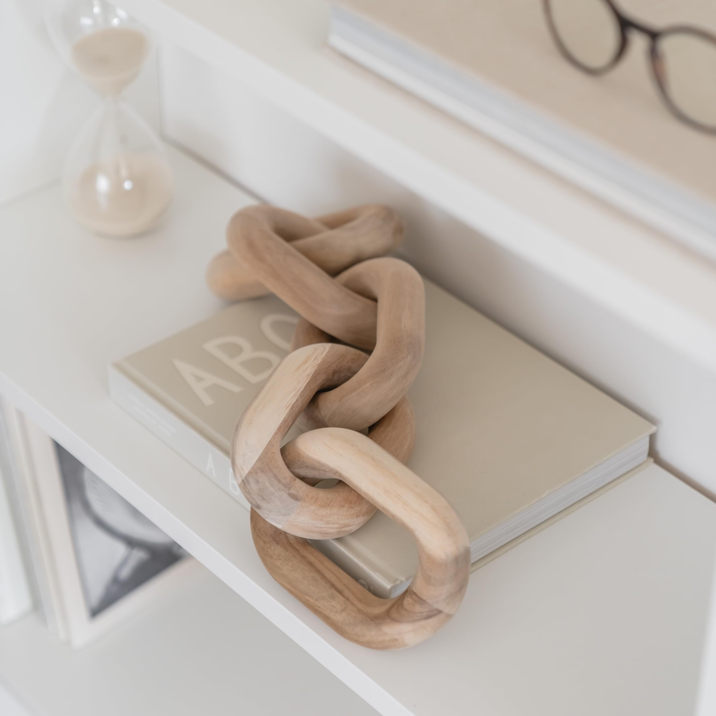 Peakoly acacia chain link decor atop a mantle with natural grain detail