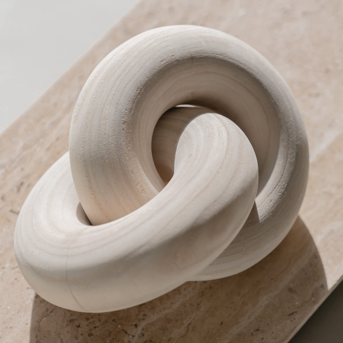 Peakoly Wood Knot Decor Natural coffee table sculpture highlights warm beige wood grain.