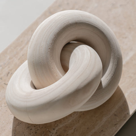 Peakoly Wood Knot Decor Natural coffee table sculpture highlights warm beige wood grain.